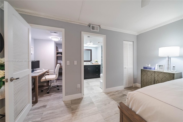 bedroom with ornamental molding and a closet