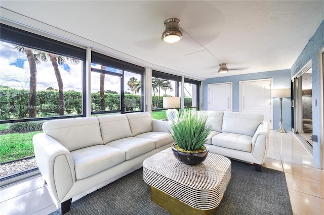 sunroom / solarium with ceiling fan