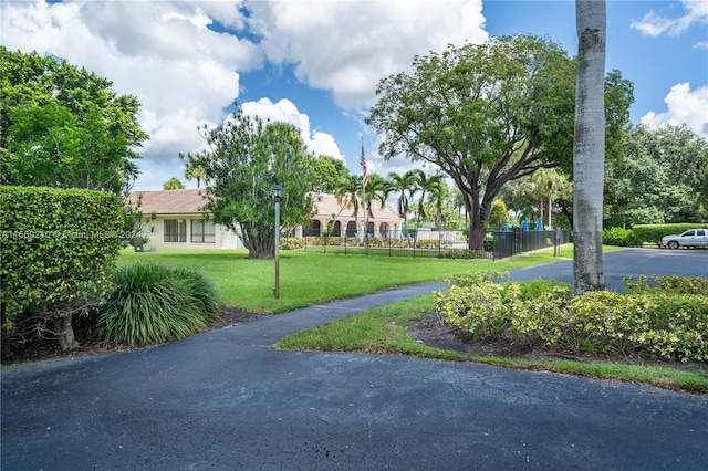 surrounding community featuring a lawn