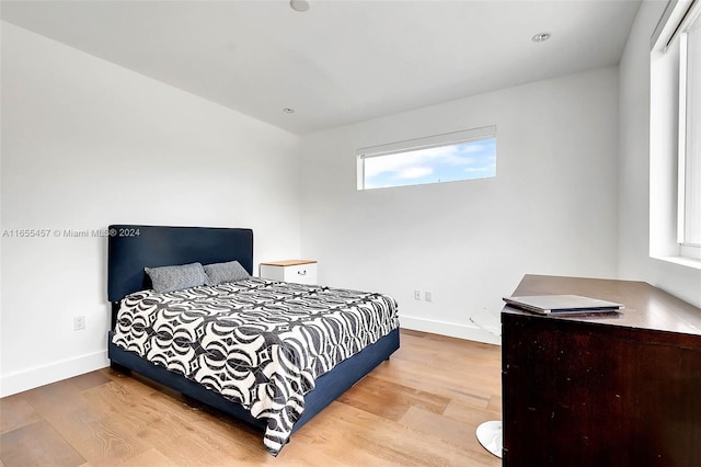 bedroom featuring light wood-type flooring