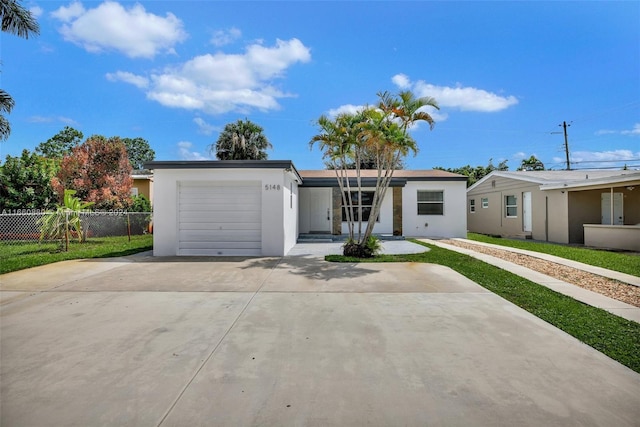 ranch-style house with a garage