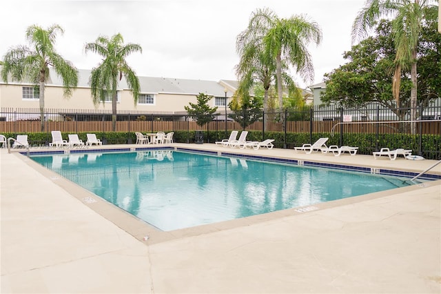 view of pool featuring a patio