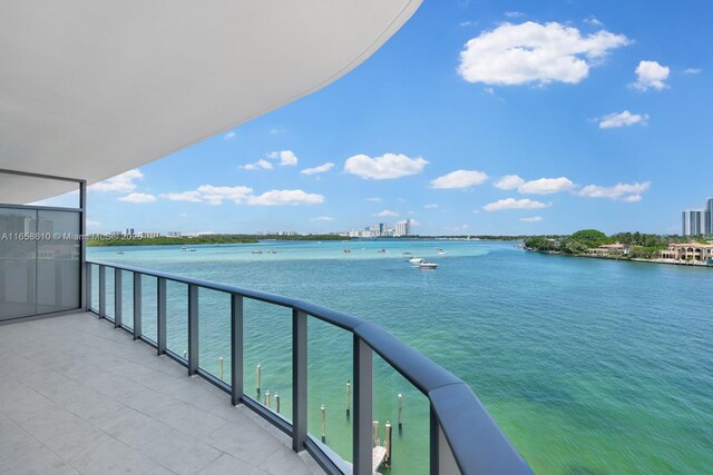 interior space featuring a water view and plenty of natural light