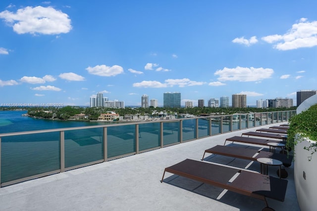 view of pool with a water view