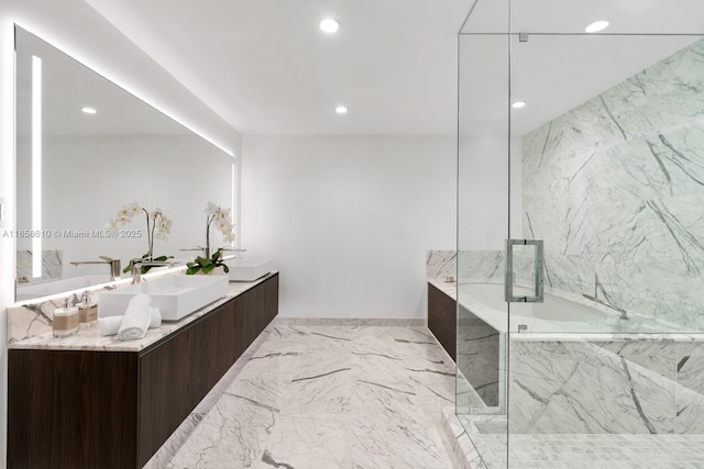 bathroom featuring vanity and a bathtub