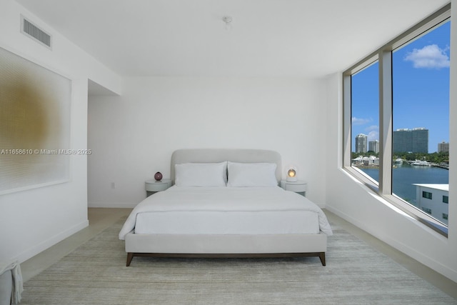 bedroom with a water view