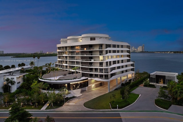 outdoor building at dusk with a water view