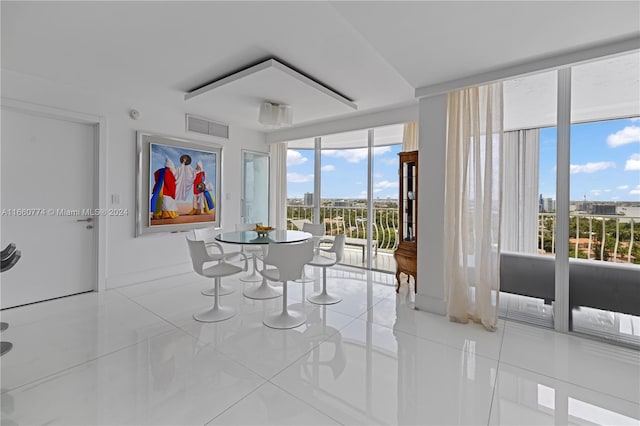 dining room featuring light tile patterned flooring