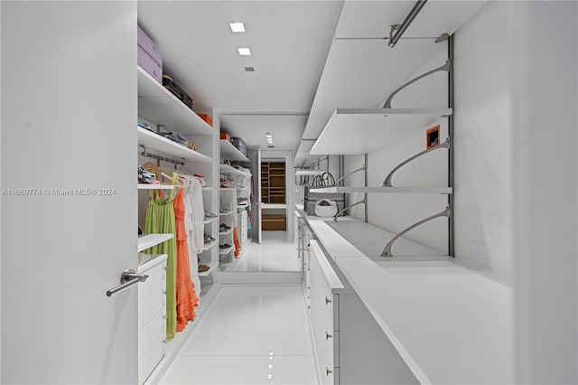 walk in closet featuring light tile patterned floors