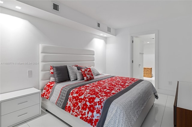 bedroom featuring light tile patterned floors