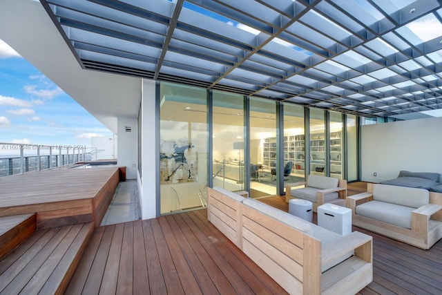 wooden terrace with a pergola