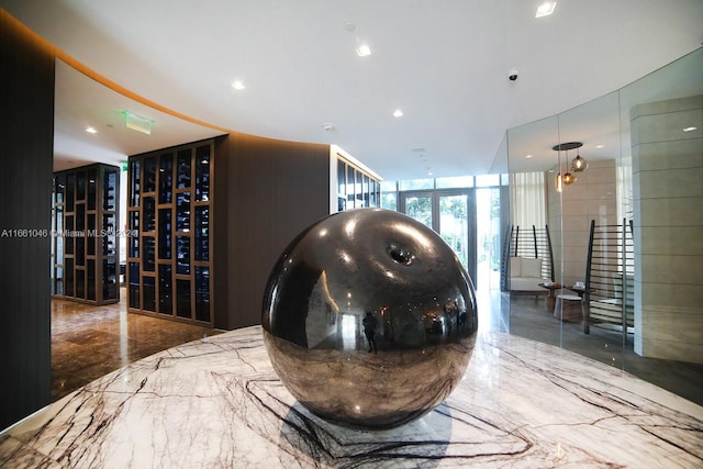 wine cellar featuring a wall of windows