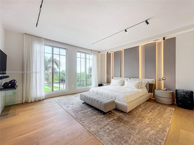 bedroom featuring light wood-type flooring