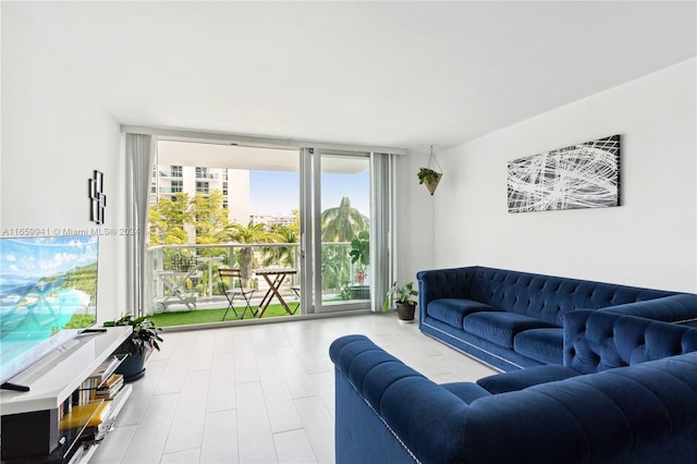 living room with floor to ceiling windows