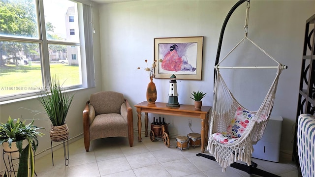 living area with light tile patterned floors