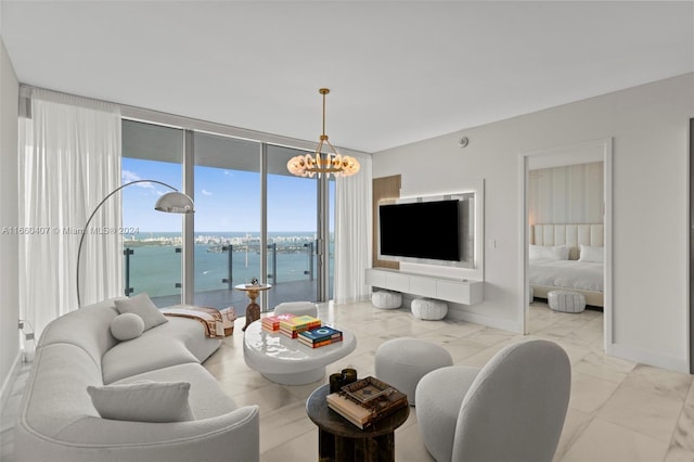 living room featuring an inviting chandelier and expansive windows