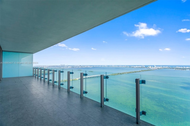 balcony featuring a water view