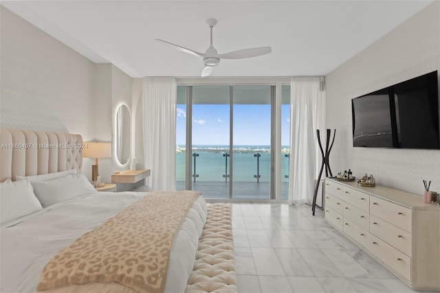 bedroom featuring ceiling fan, floor to ceiling windows, and access to exterior