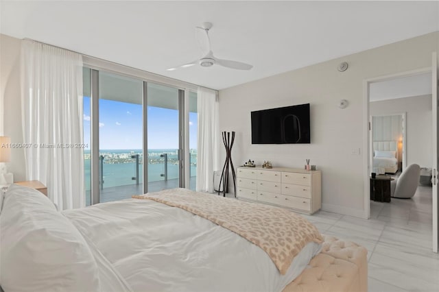 bedroom featuring ceiling fan and access to outside