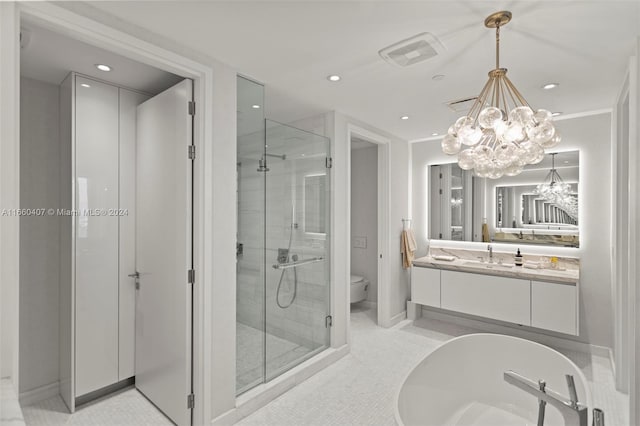 full bathroom with vanity, a chandelier, toilet, and separate shower and tub