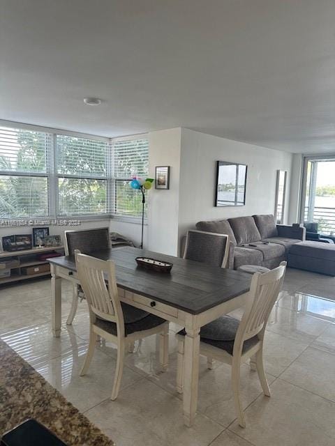 dining room with light tile patterned floors