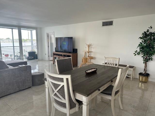 dining area featuring a water view