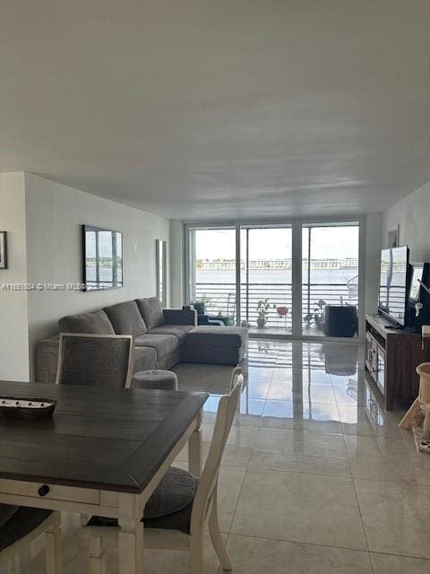 living room featuring light tile patterned flooring