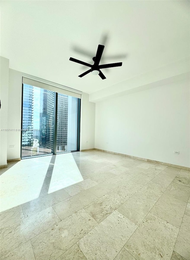 empty room featuring ceiling fan