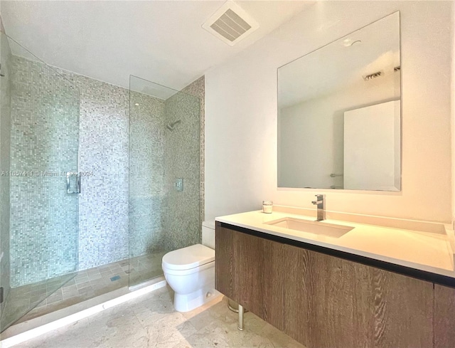 bathroom with walk in shower, vanity, and toilet