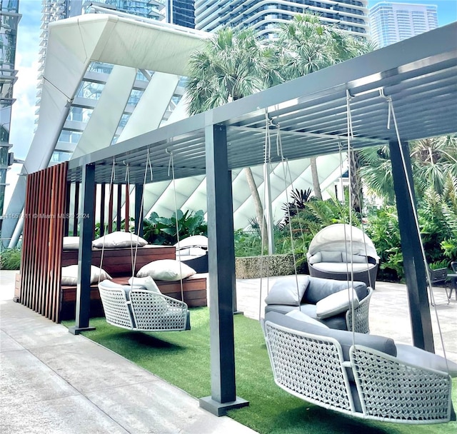 view of patio / terrace with an outdoor hangout area and a pergola