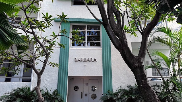 exterior space featuring stucco siding