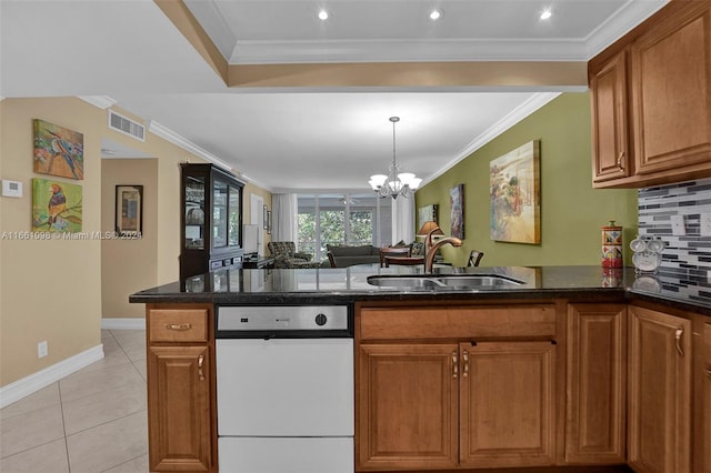 kitchen with decorative backsplash, white dishwasher, crown molding, sink, and a notable chandelier