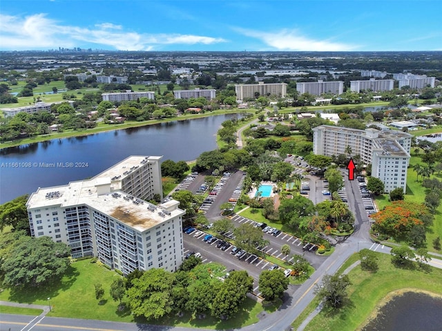 drone / aerial view with a water view