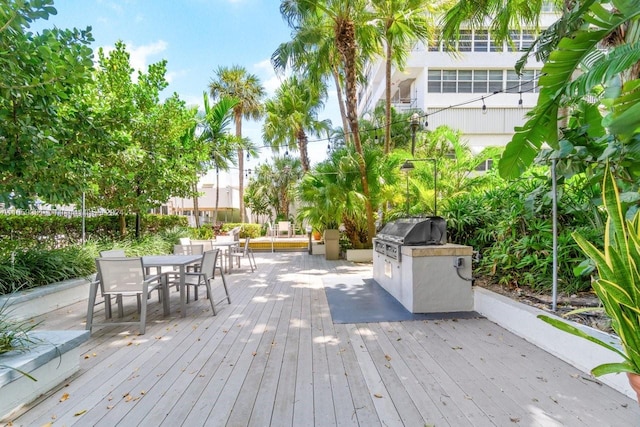 wooden deck with area for grilling