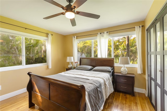 bedroom featuring ceiling fan and light wood-type flooring