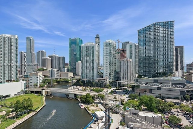 property's view of city featuring a water view