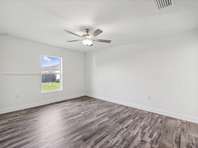 unfurnished room featuring ceiling fan and hardwood / wood-style flooring