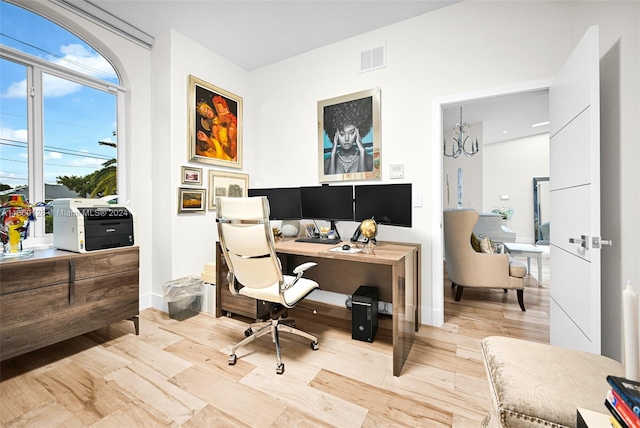 home office featuring light hardwood / wood-style flooring