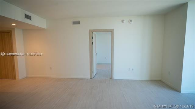 empty room featuring light wood-type flooring