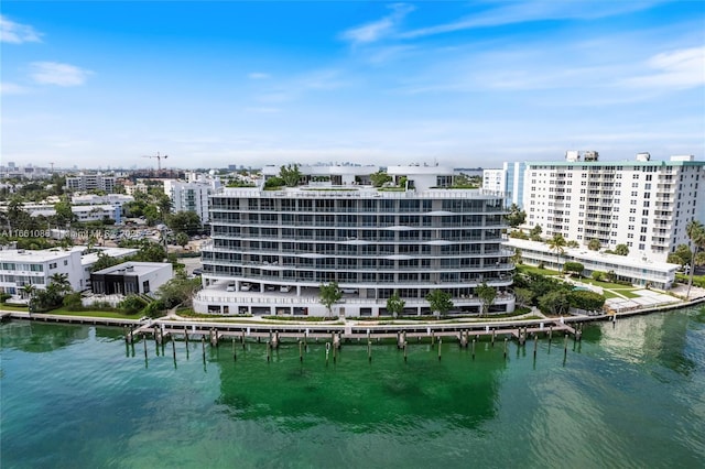 view of building exterior with a water view