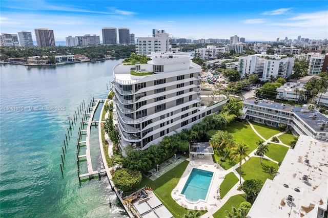 birds eye view of property with a water view