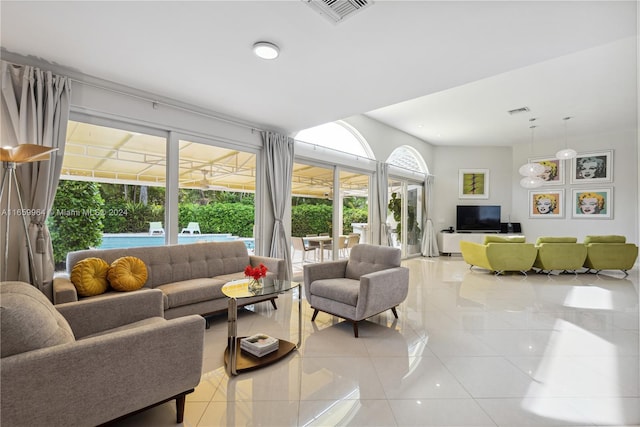 living room with light tile patterned floors