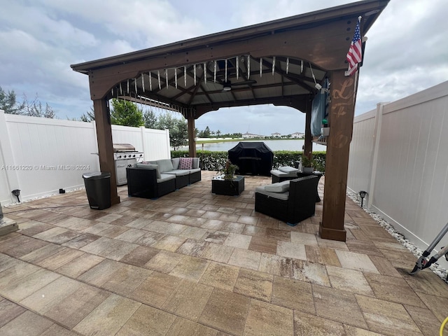 view of patio with a gazebo and an outdoor living space