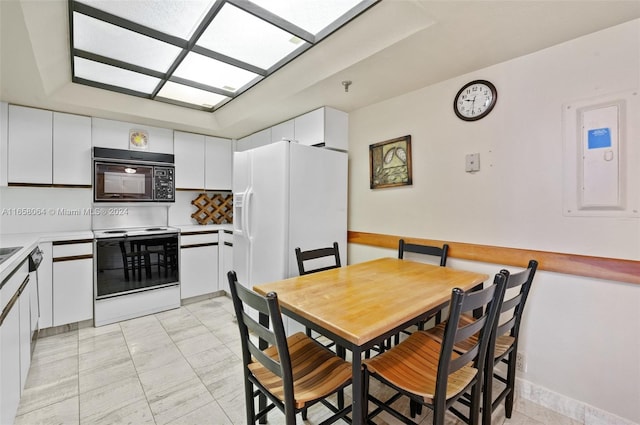 dining room featuring electric panel