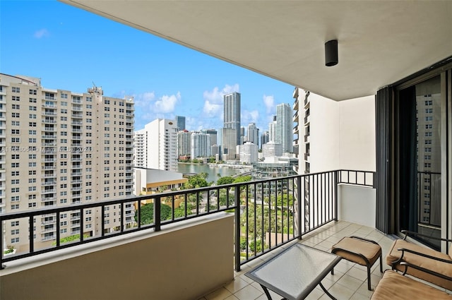 balcony featuring a water view