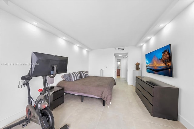 bedroom featuring light tile patterned flooring