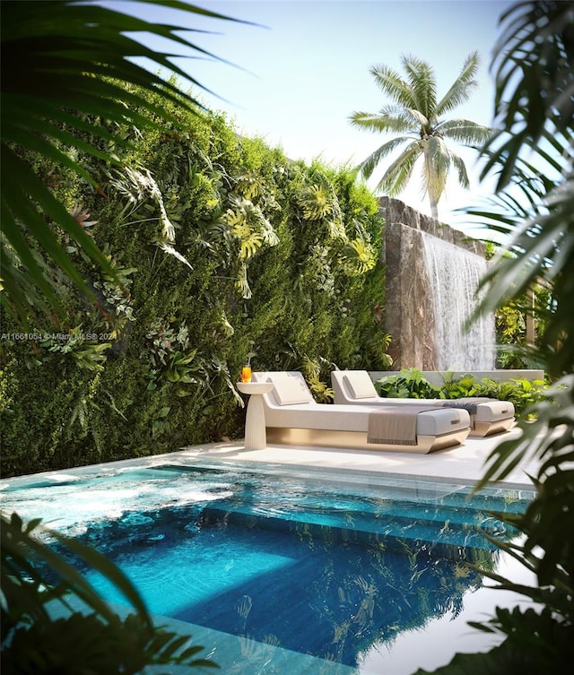 pool with a patio area