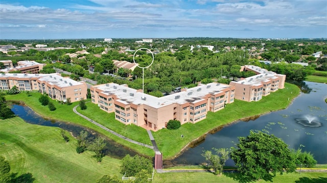 drone / aerial view featuring a water view