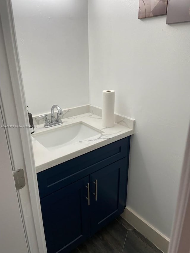 bathroom featuring tile patterned floors and vanity