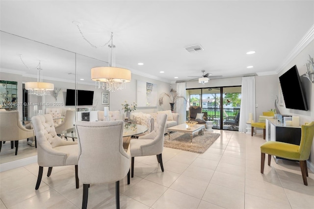 dining area featuring light tile patterned floors, ceiling fan with notable chandelier, and ornamental molding